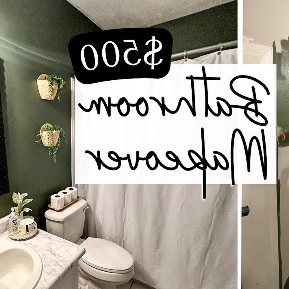 Baño estético con verde profundo y decoraciones modernas