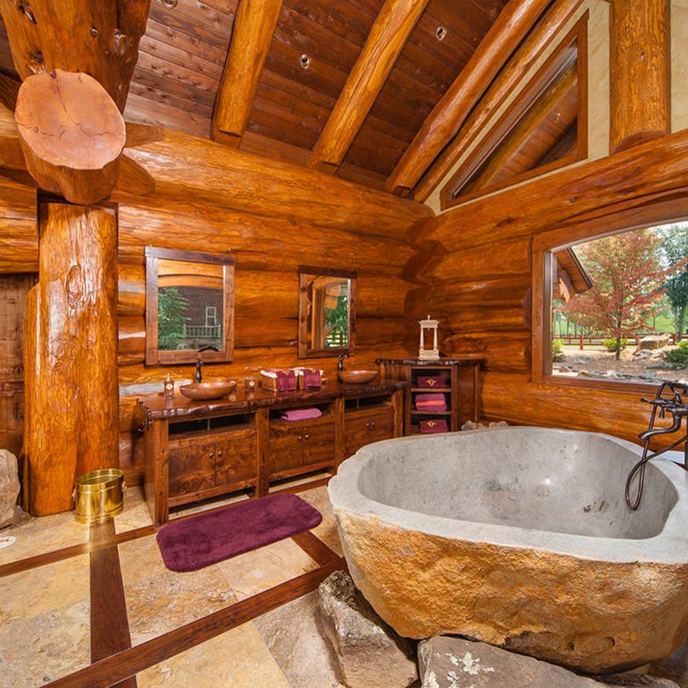 A juxtaposition of modern and rustic elements in cabin bathroom decor.