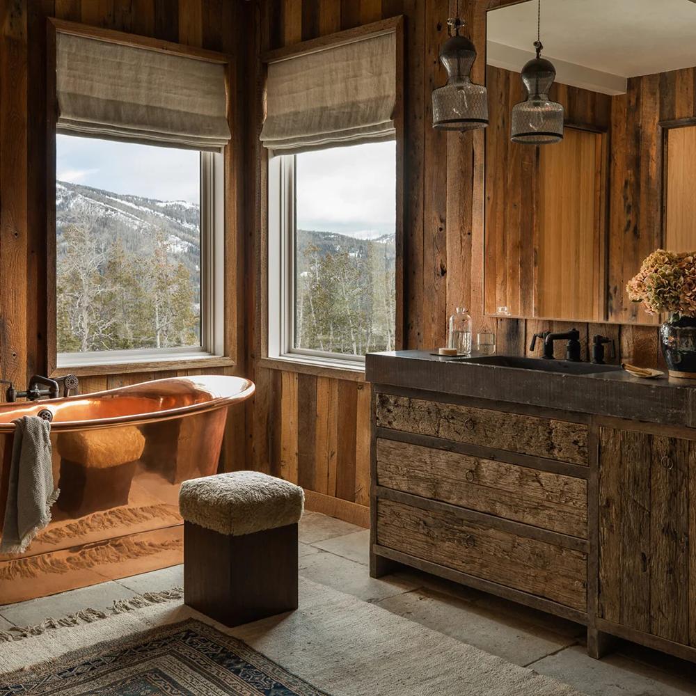 Freestanding copper bathtub as a luxurious focal point in the bathroom.