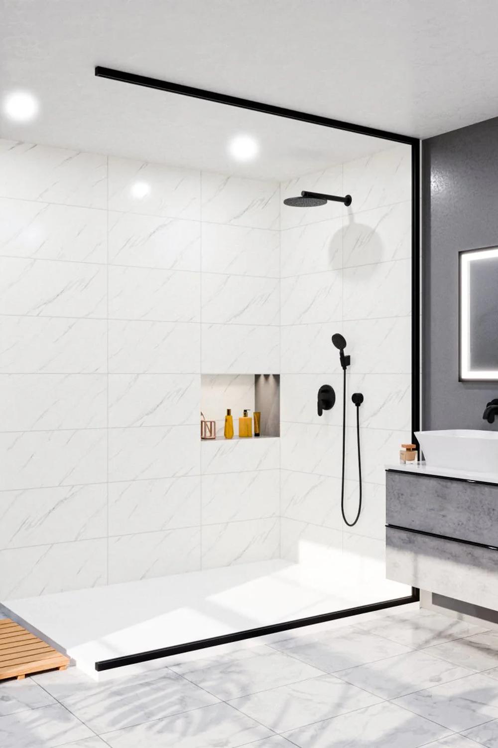 Modern bathroom featuring sleek Carrara marble design with minimalist aesthetics