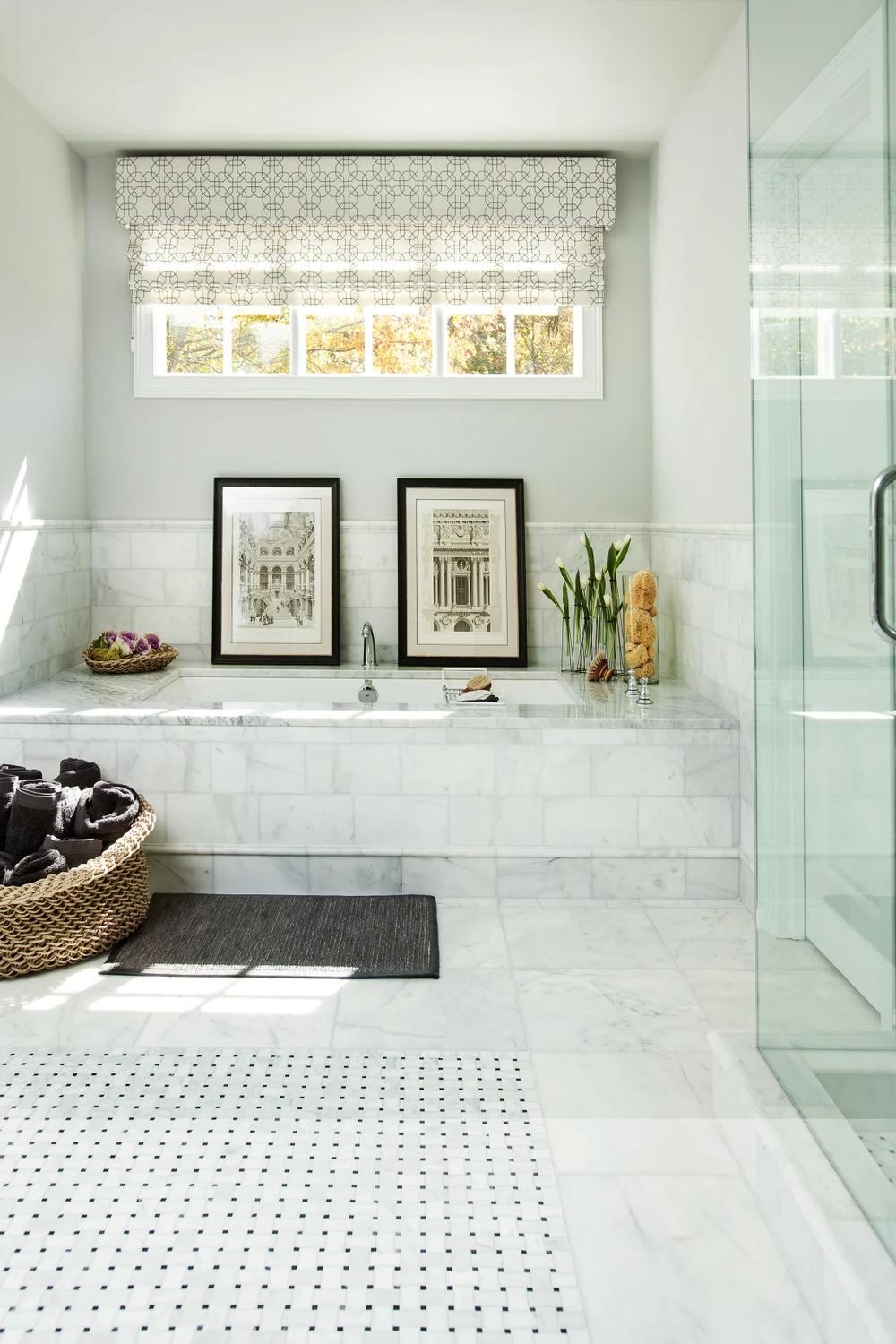 Luxurious bathroom with built-in Carrara marble bathtub