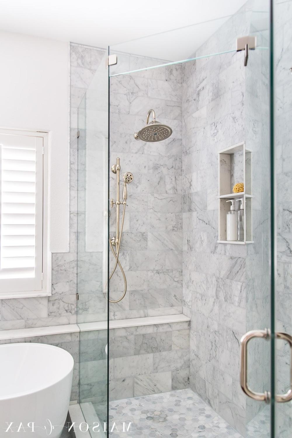 Luxurious bathroom showcasing opulent Carrara marble with modern features