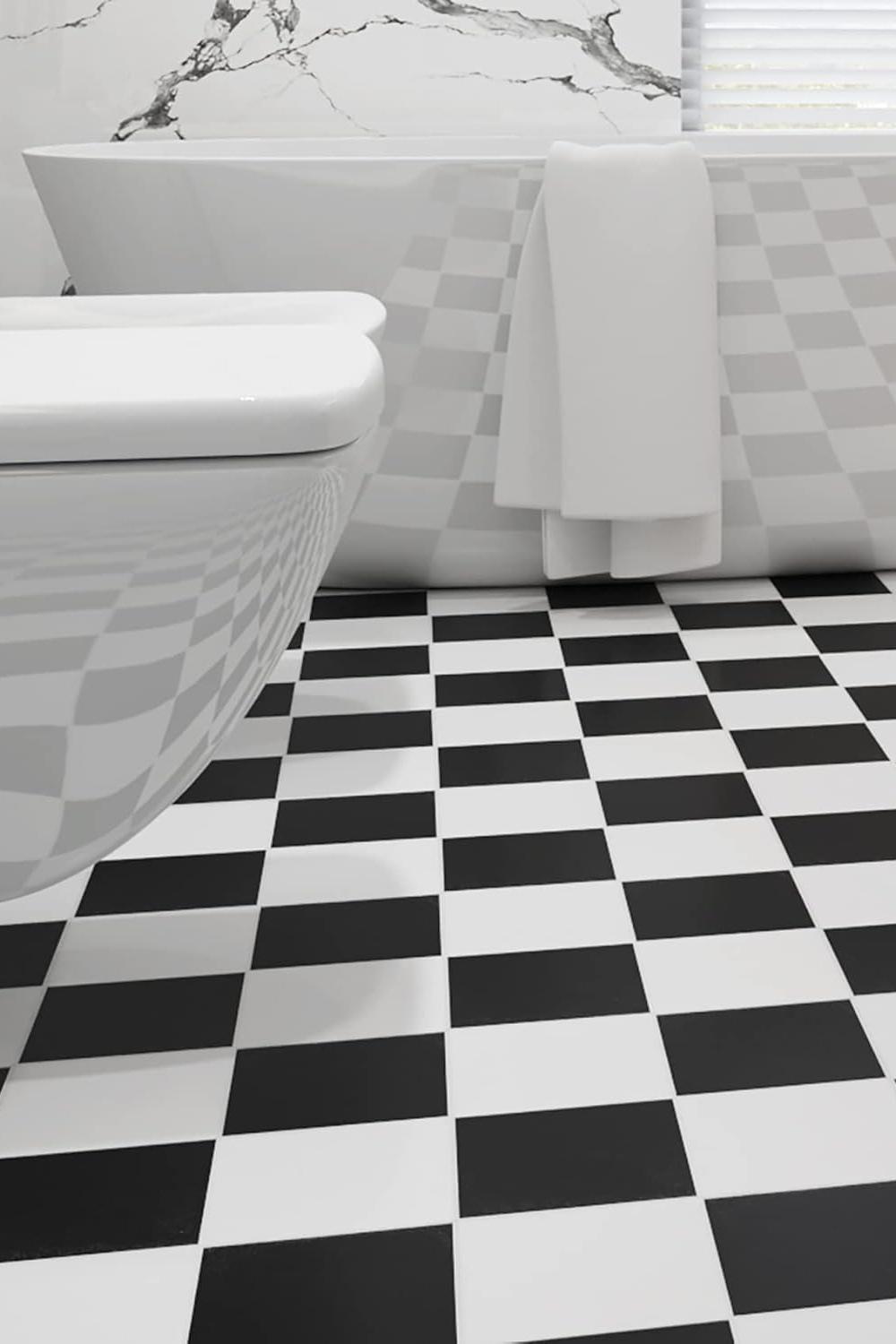 Baño moderno con azulejos a cuadros negro y blanco