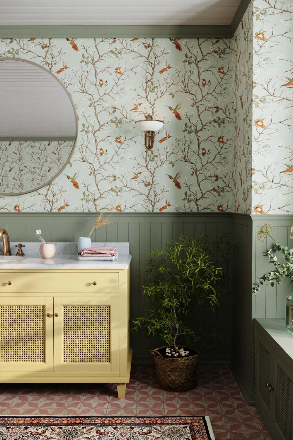 Charming turquoise chinoiserie wallpaper with elements of nature in a stylish bathroom setting.