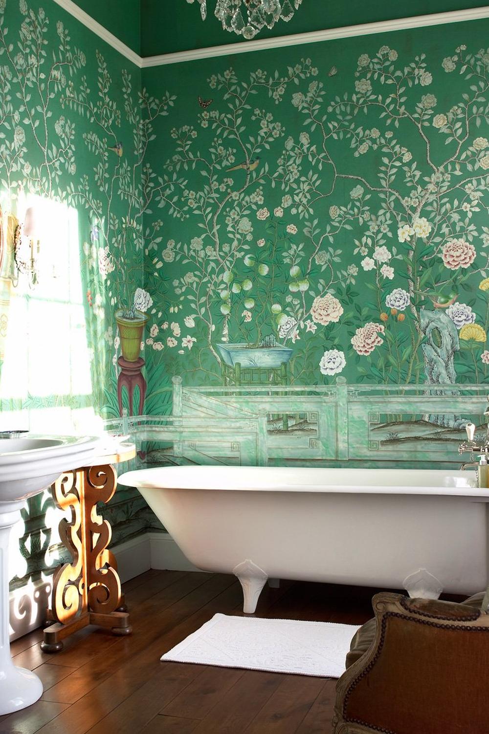 Rich green Chinoiserie wallpaper creating a vintage style and elegance in a modern bathroom setup.