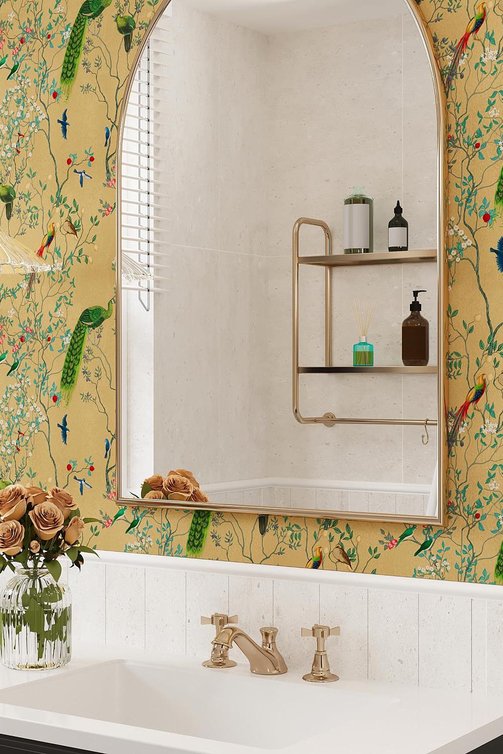 Luxurious golden Chinoiserie wallpaper combined with elegant fixtures and charming decor elements in a bathroom.