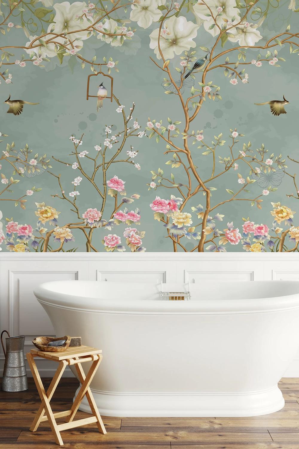 Serene bathroom decorated with artistic chinoiserie wallpaper featuring vibrant florals and nature elements.