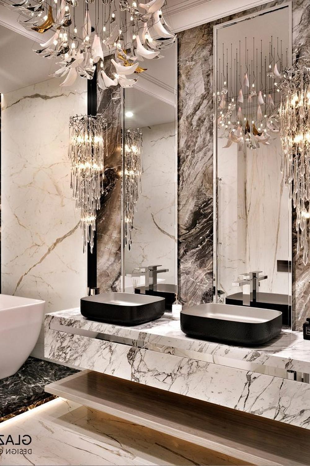 Luxurious bathroom design featuring contrasting white and gray tones with gold accents for a high-end look.