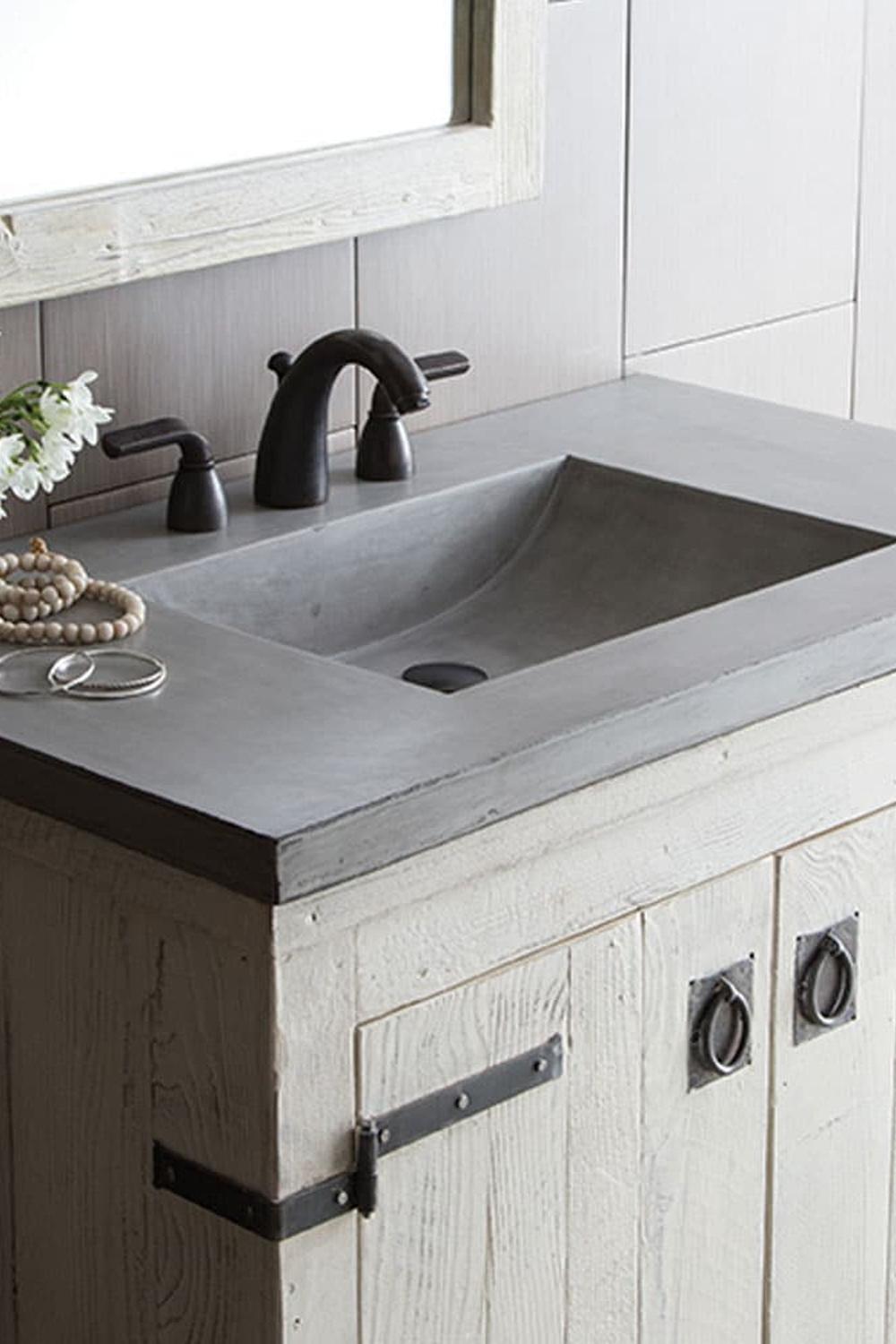 Rustic Wood and Concrete Blend Vanity featuring a smooth concrete countertop and textured wooden base.
