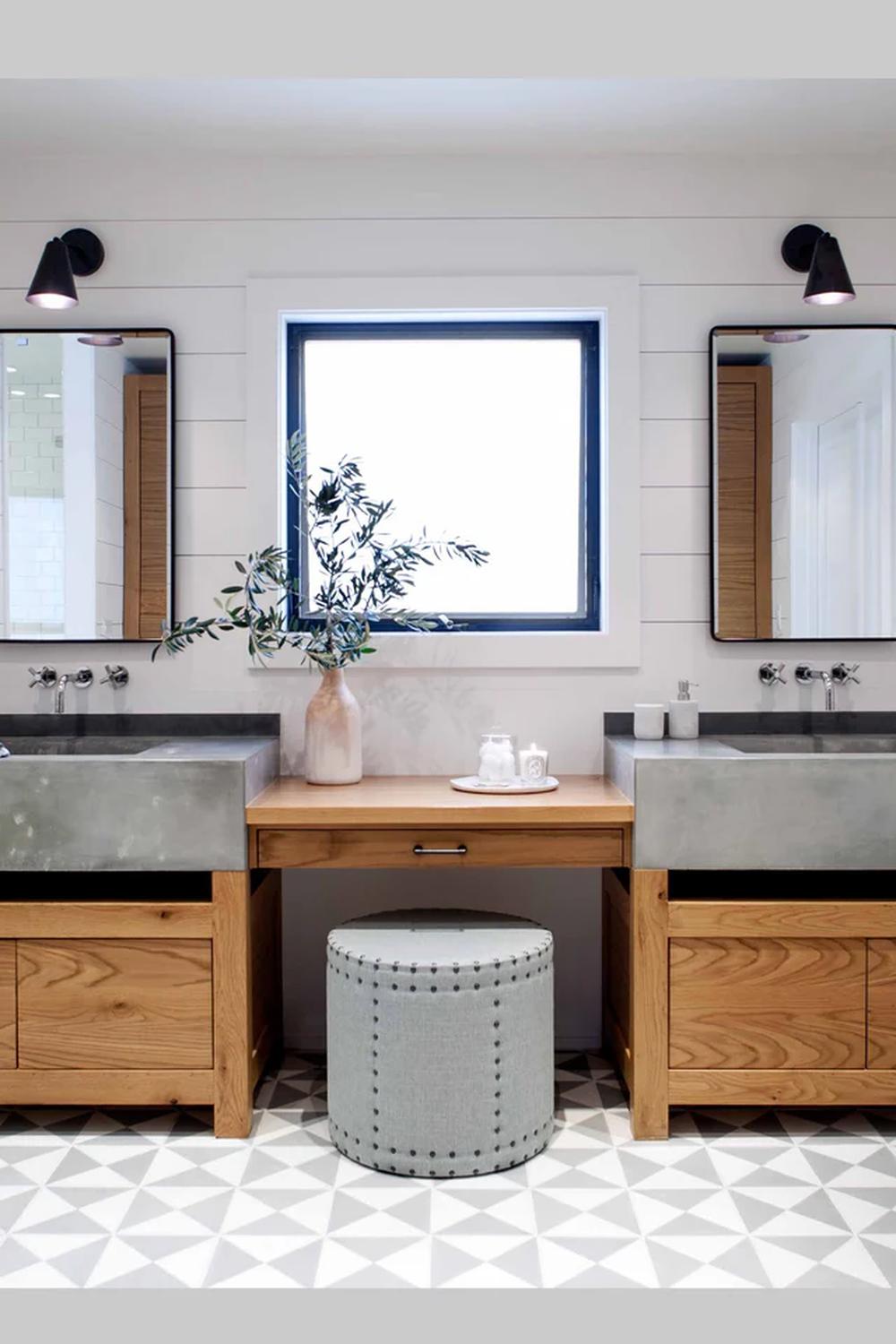 Dual Concrete Basins on Wooden Base Vanity with elegant storage options.