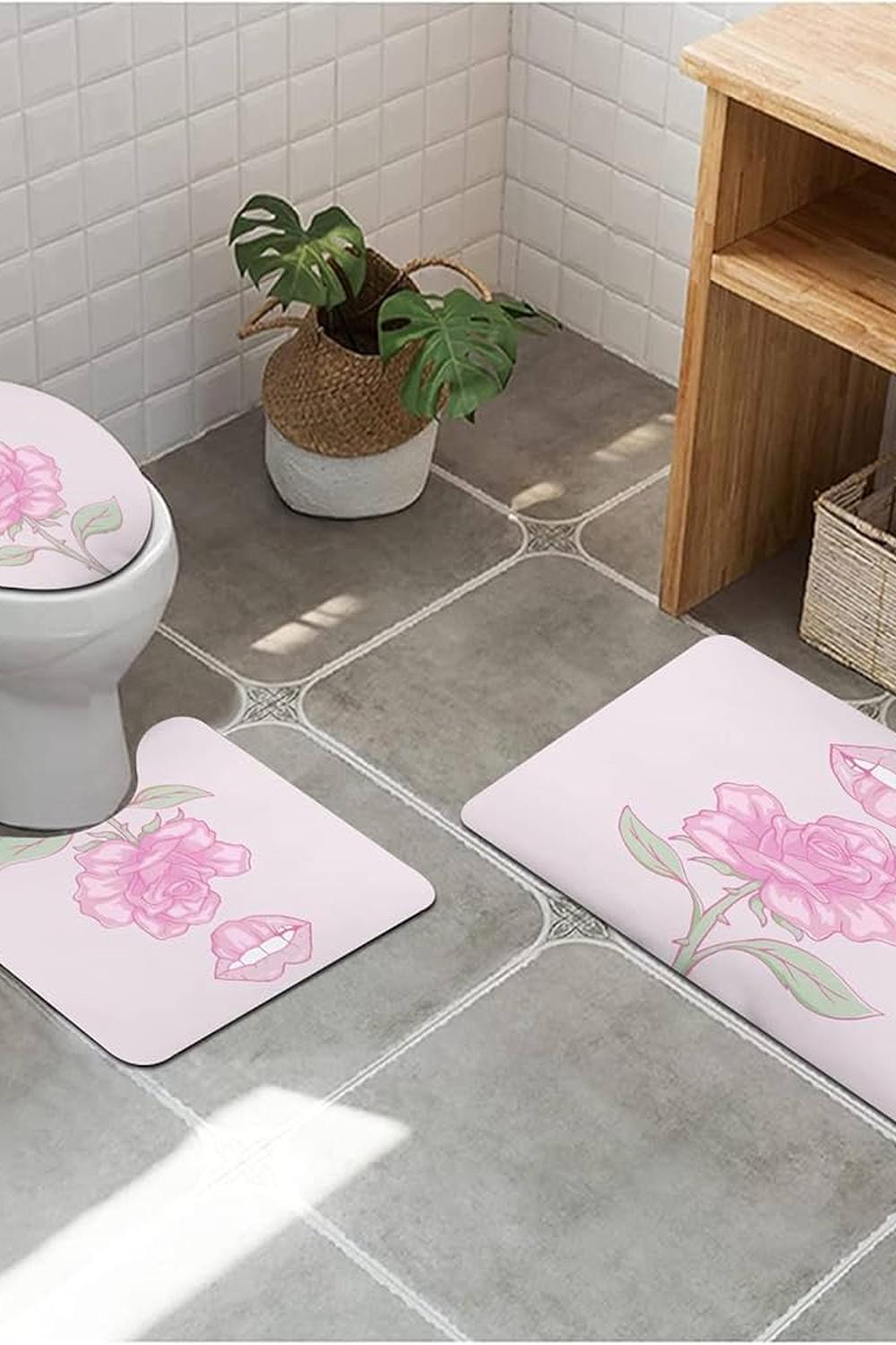 A coquette bathroom with playful accessories and soft pink tones.