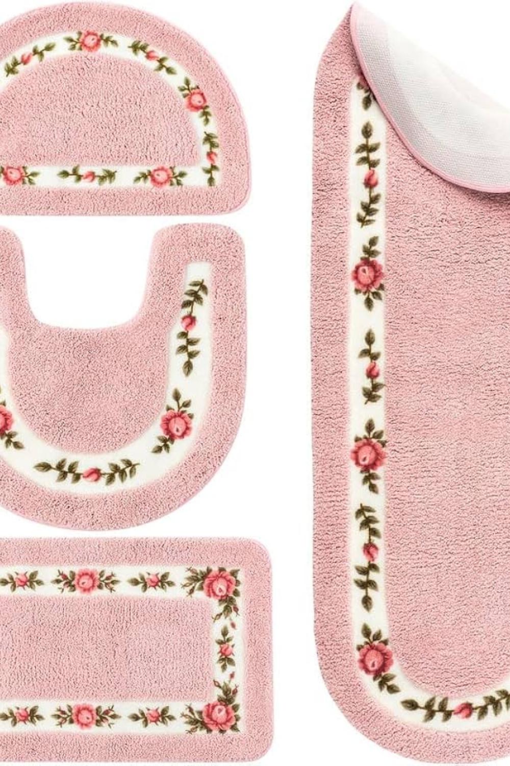 A set of soft, plush bathroom mats in a coquette style.