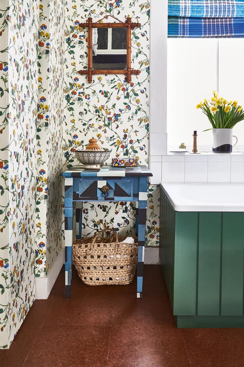 Charming bathroom corner with cork flooring and vibrant floral decor