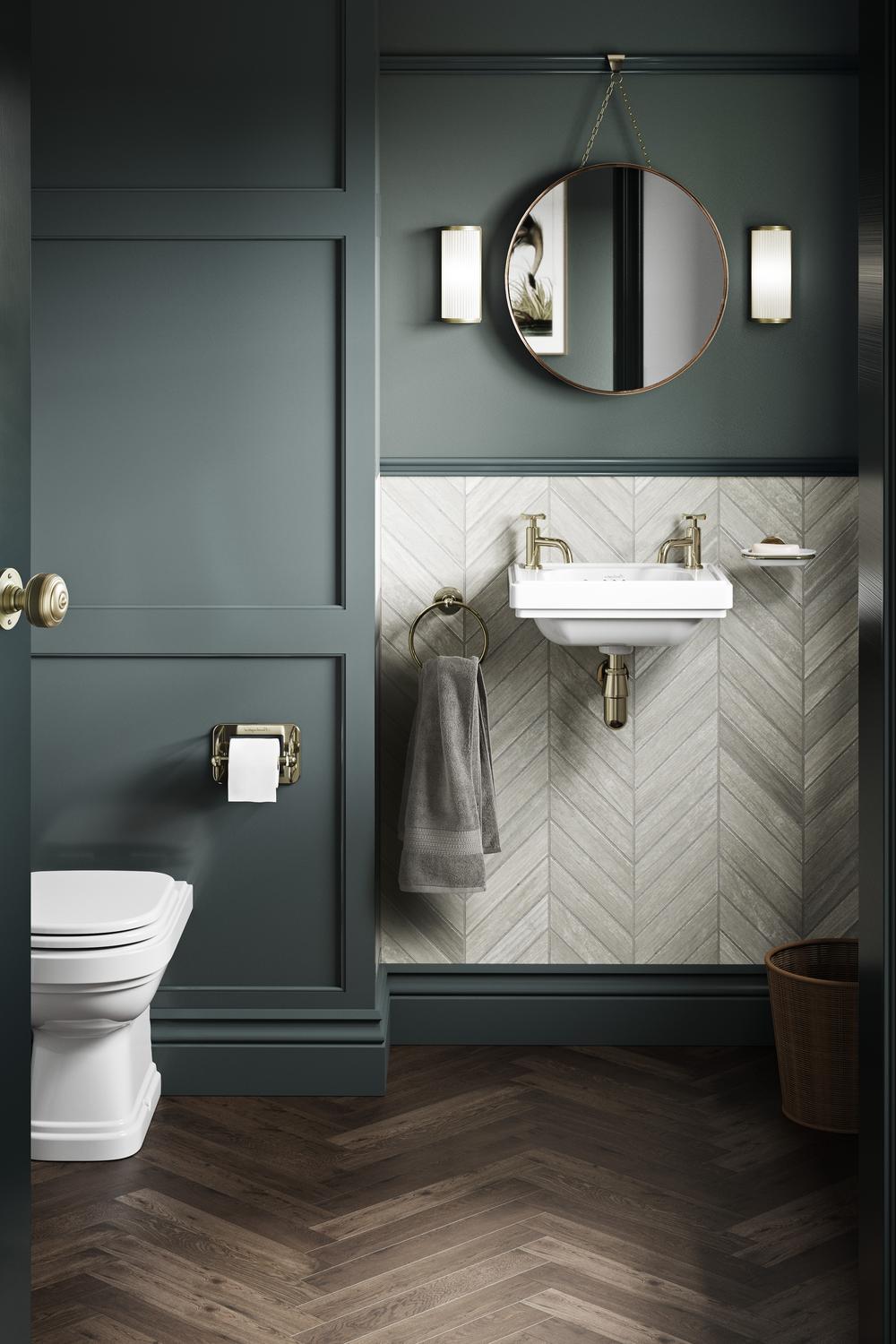 Modern dark green bathroom featuring herringbone wall texture and elegant furnishings