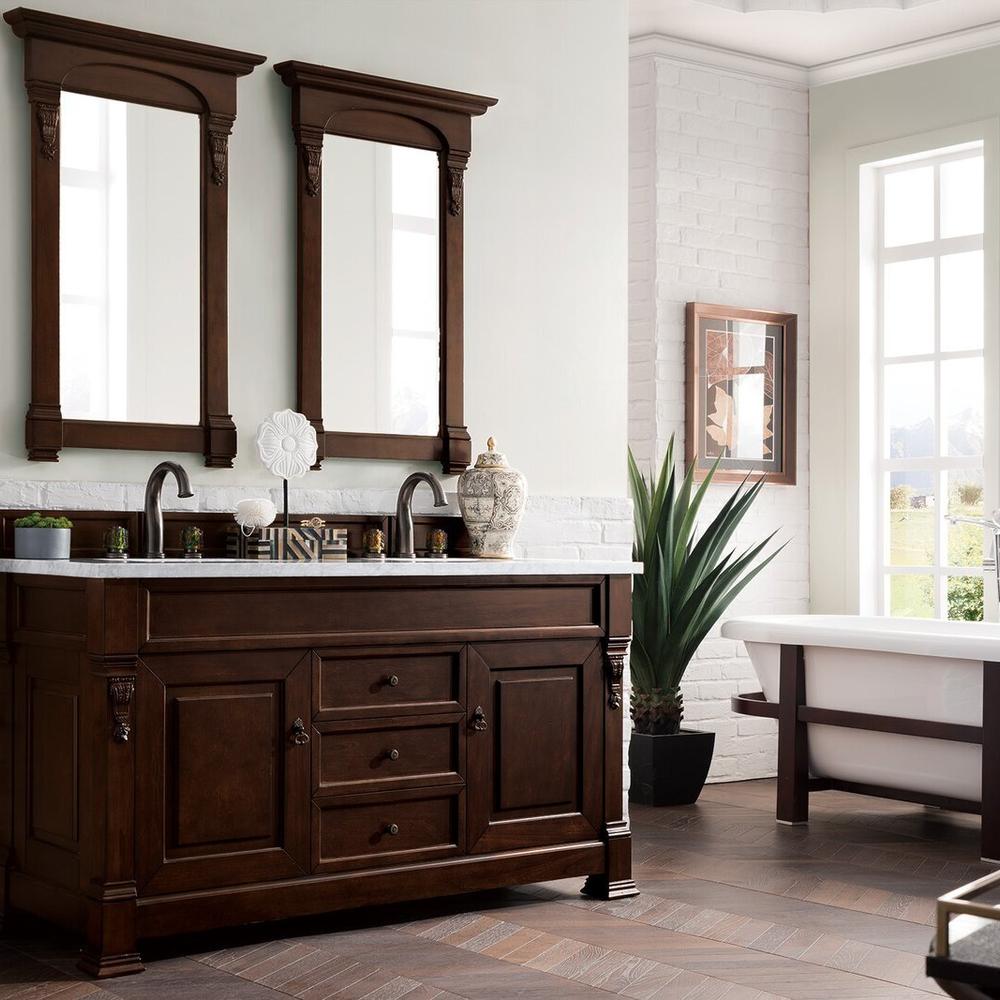Luxuriously detailed dark wood bathroom vanity with stylish fixtures