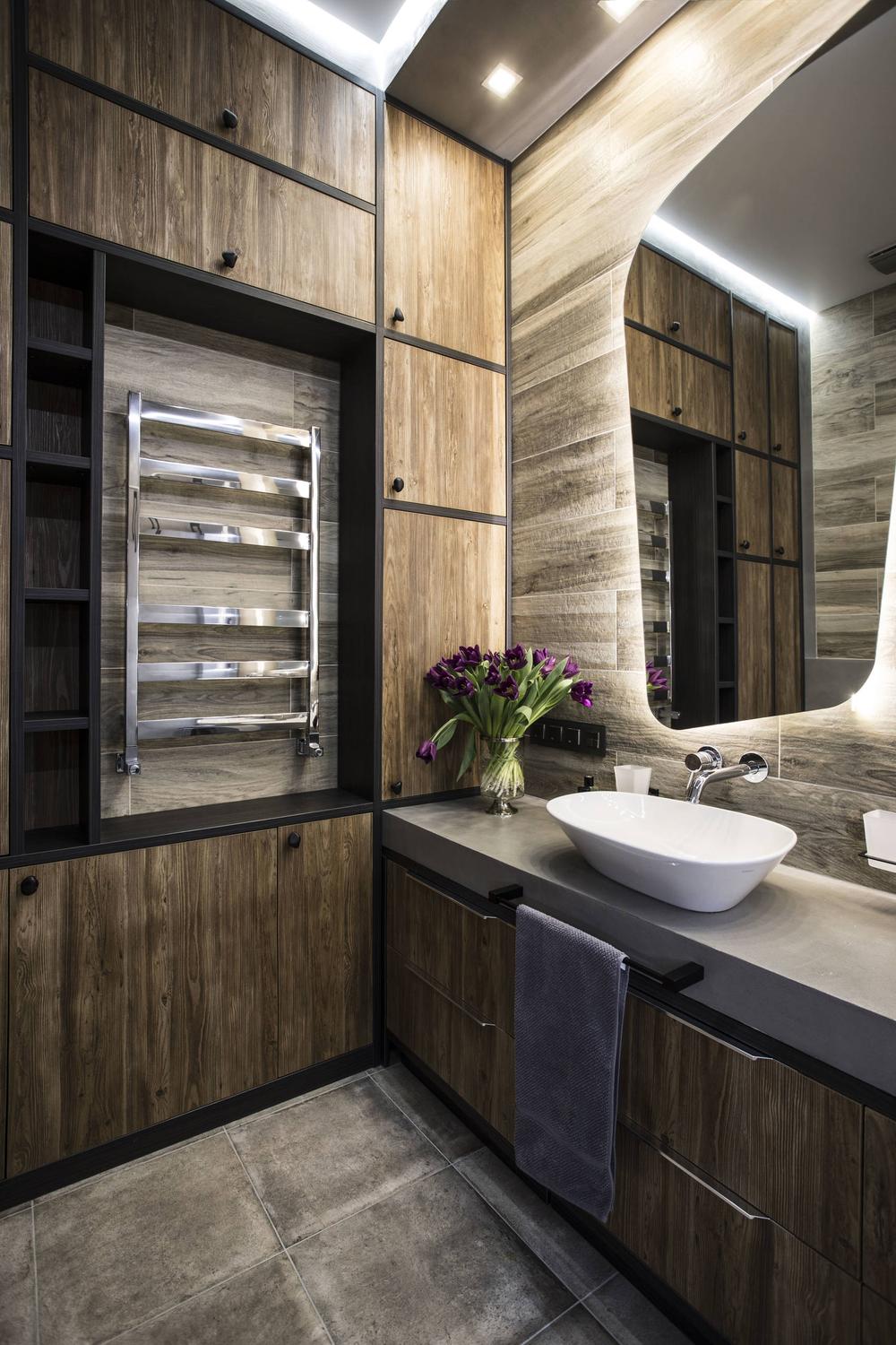 Seamless dark wood bathroom vanity design with integrated components