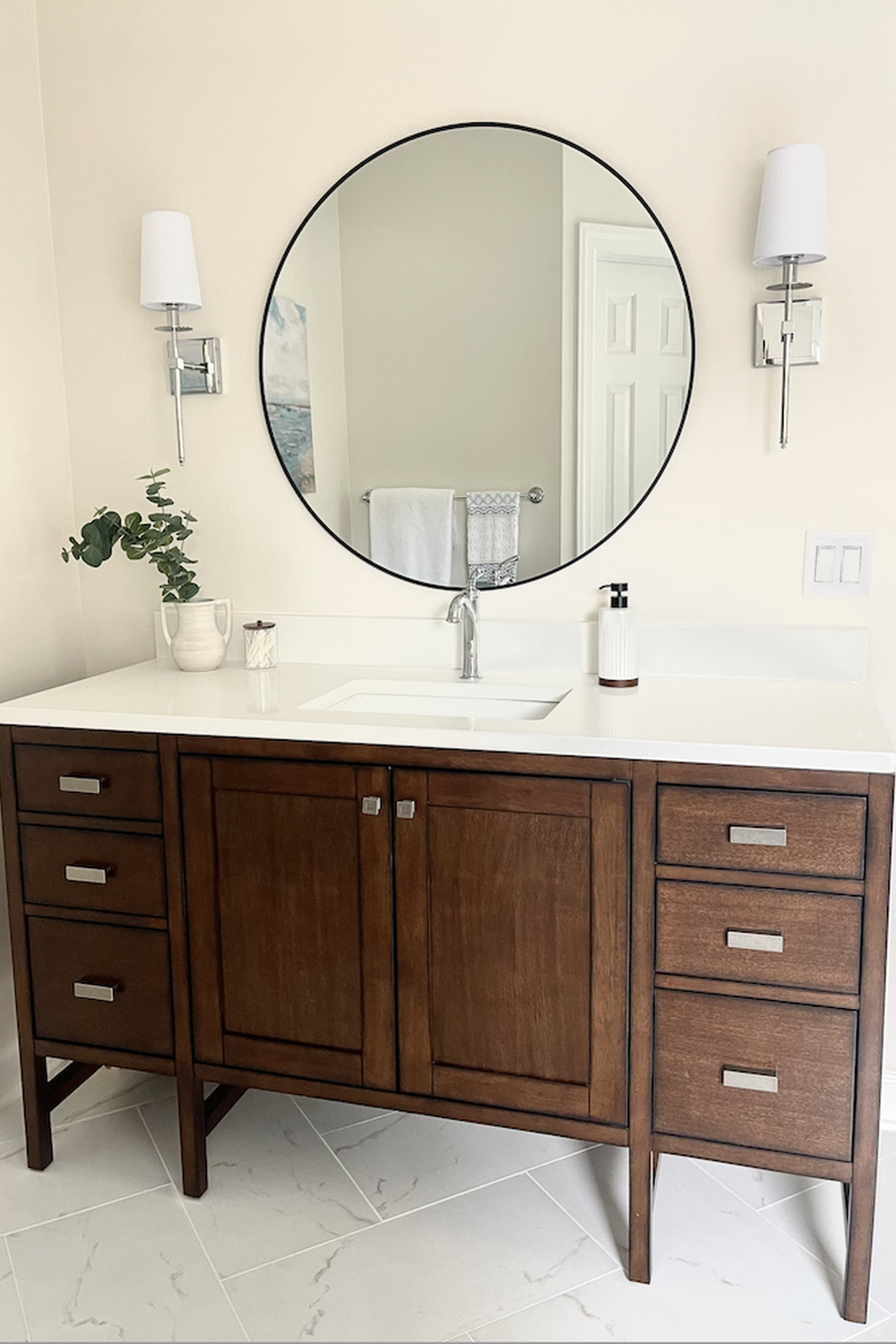 Streamlined modern dark wood design featuring elegant fixtures