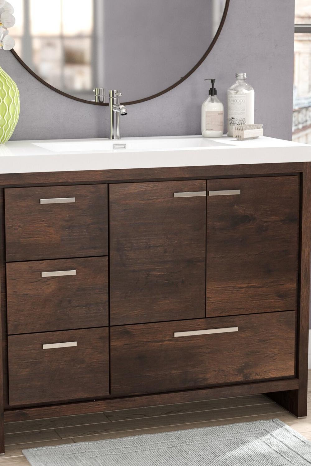 Unique layering in dark wood bathroom vanity design