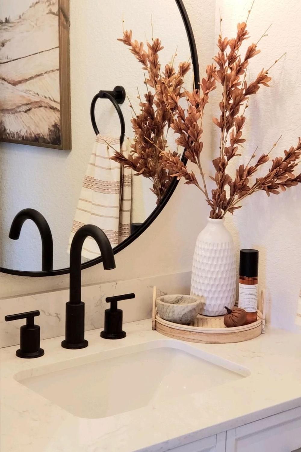 Scented accessories in a fall bathroom create a warm and inviting atmosphere.