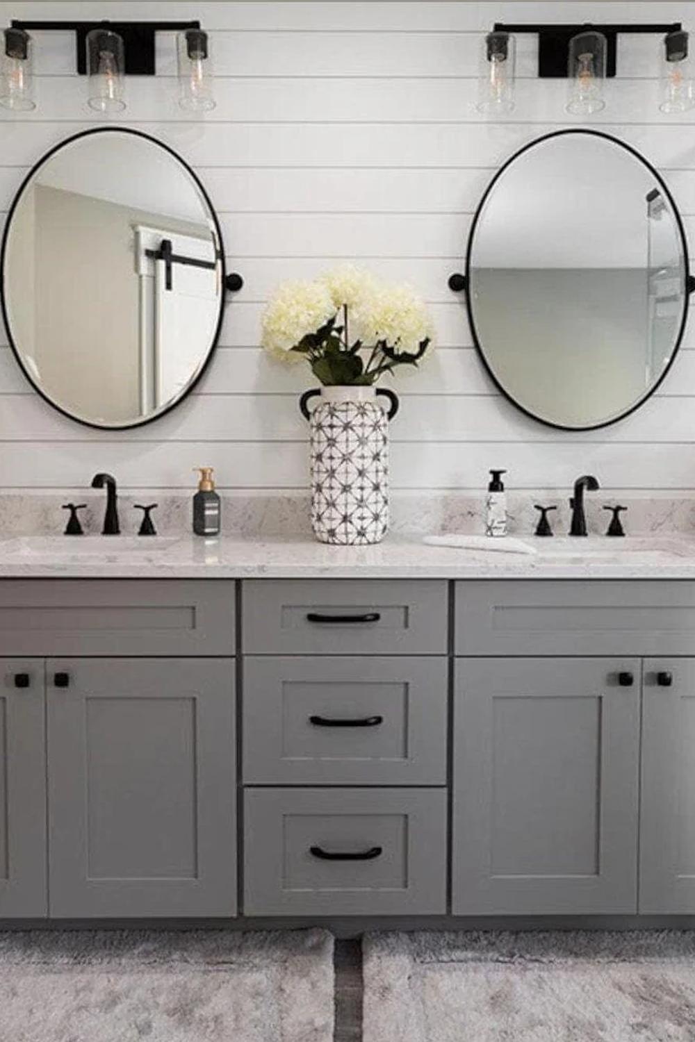 Sleek gray double sink vanity with artful touches