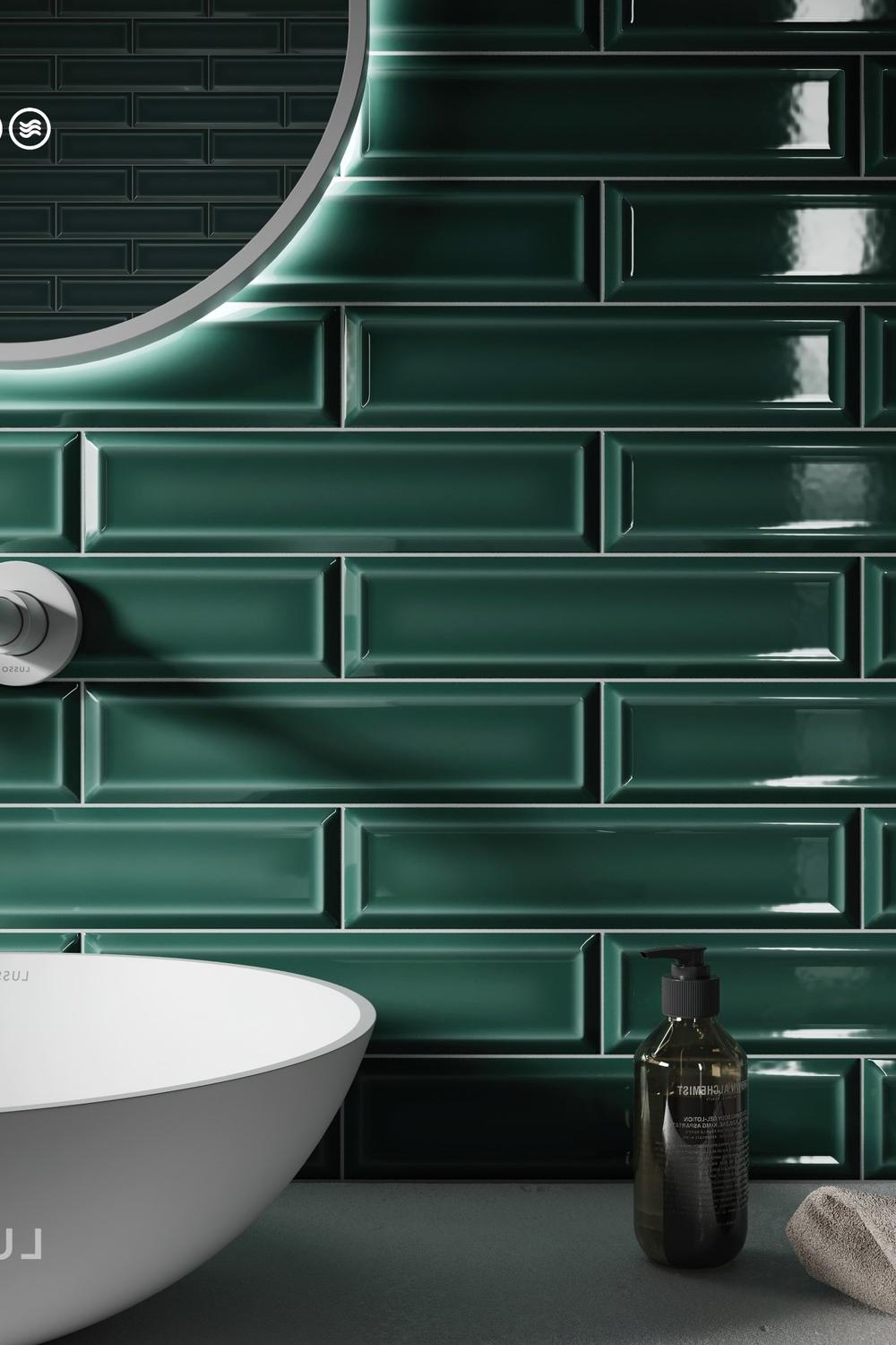 A stylish bathroom featuring vibrant emerald green tile walls