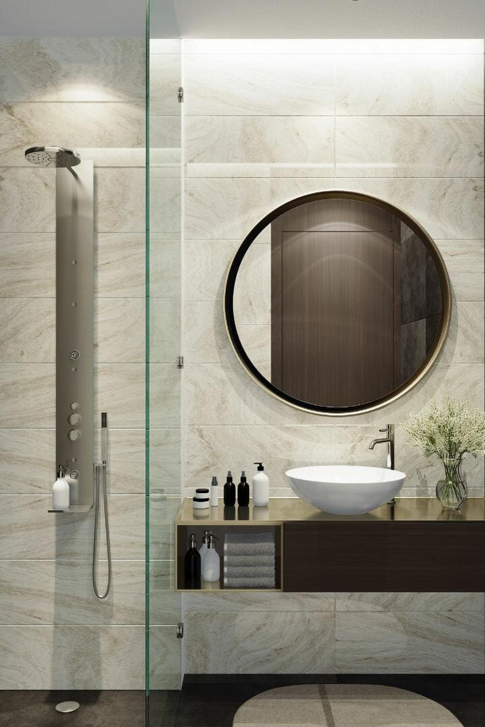Modern minimalist ensuite bathroom with elegant glass features.