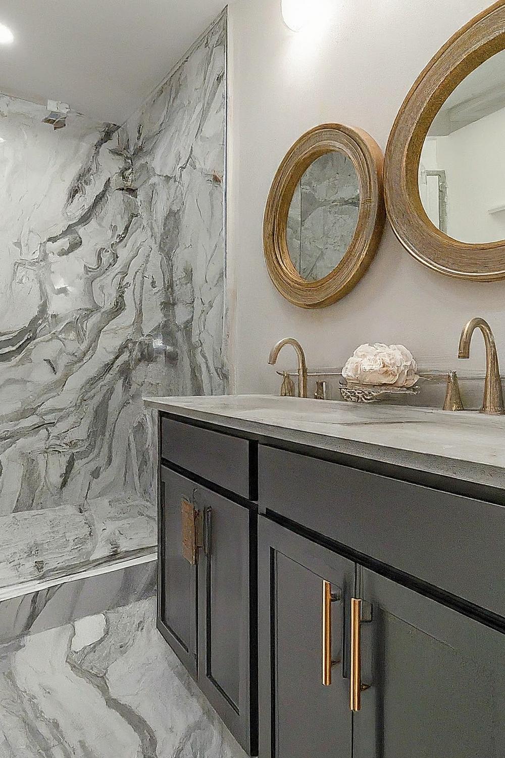 Modern bathroom showcasing epoxy flooring with a luxury marble-like finish and sleek fixtures.