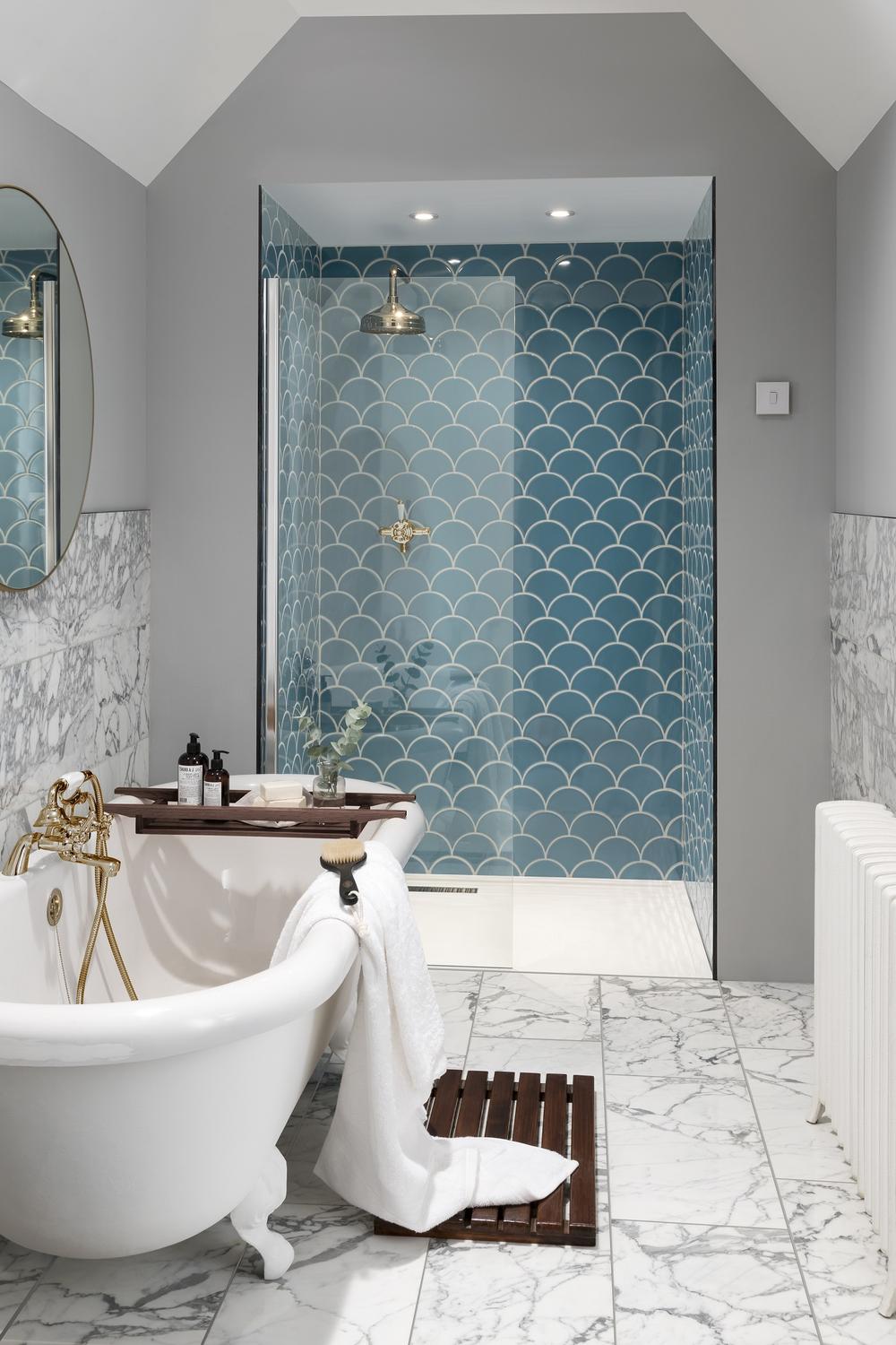 Modern bathroom with fish scale tile design in shades of blue