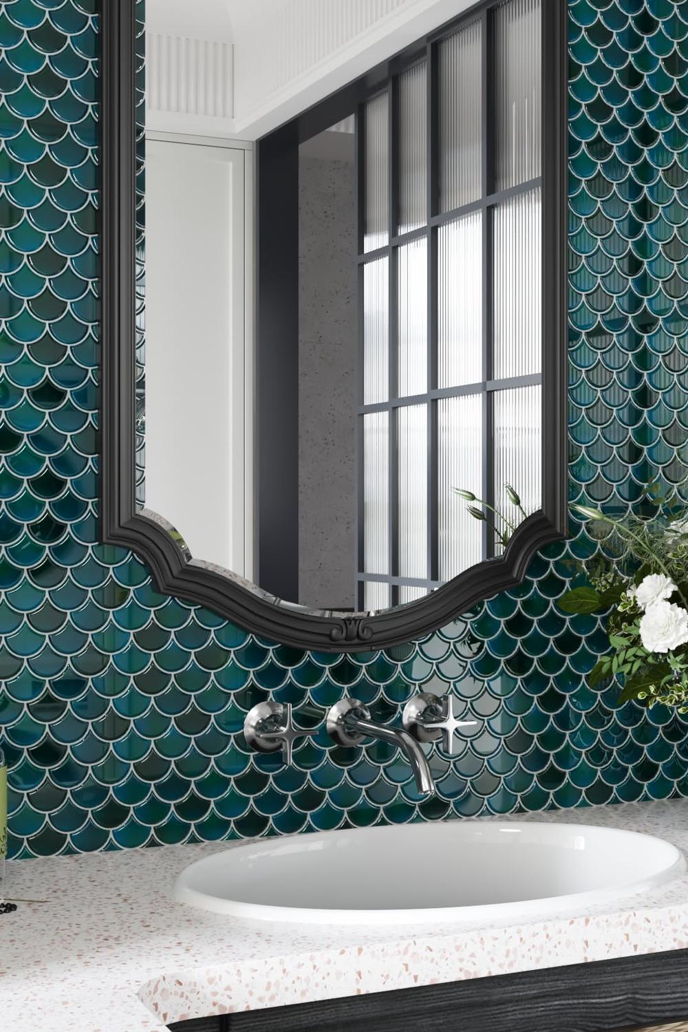 Bathroom design featuring deep teal fish scale tile backsplash