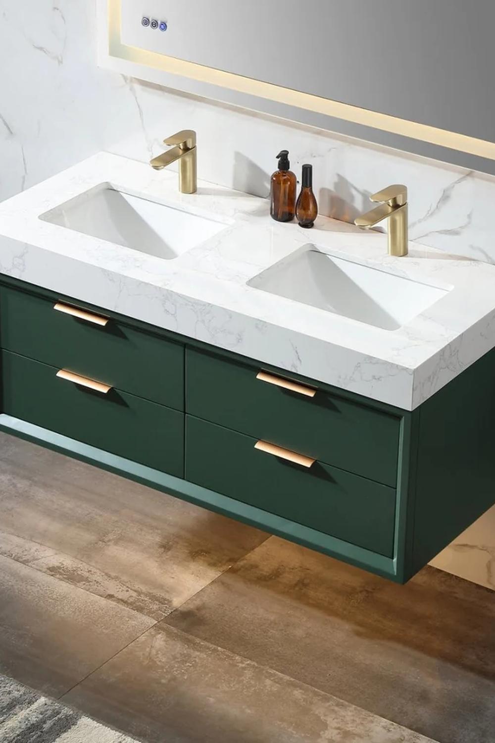 A stylish floating marble vanity with rich green cabinetry, creatively combining elegance with functionality.
