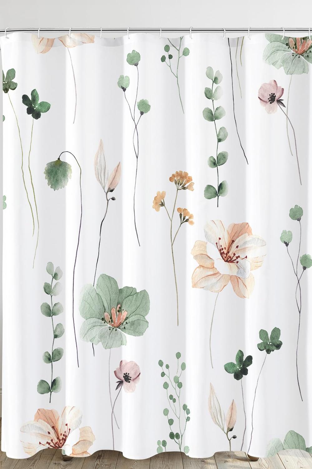 Watercolor floral shower curtain with pastel shades enhancing bathroom decor.