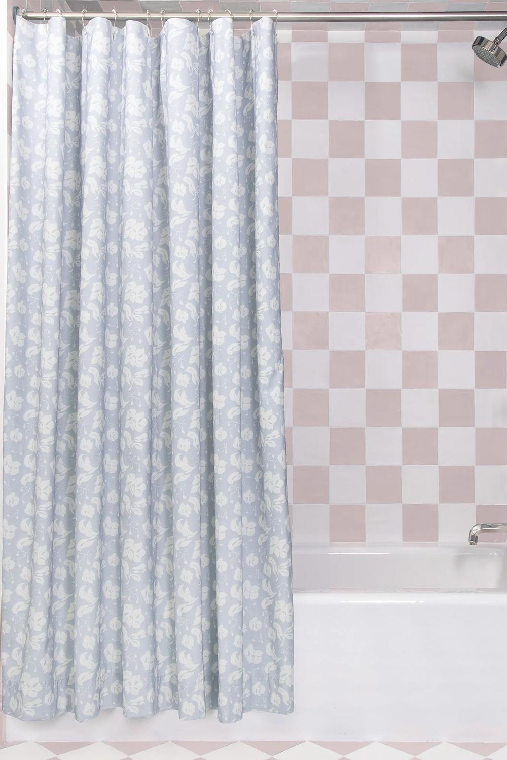 Sophisticated floral shower curtain highlighting soft hues and gentle designs in a modern bathroom.