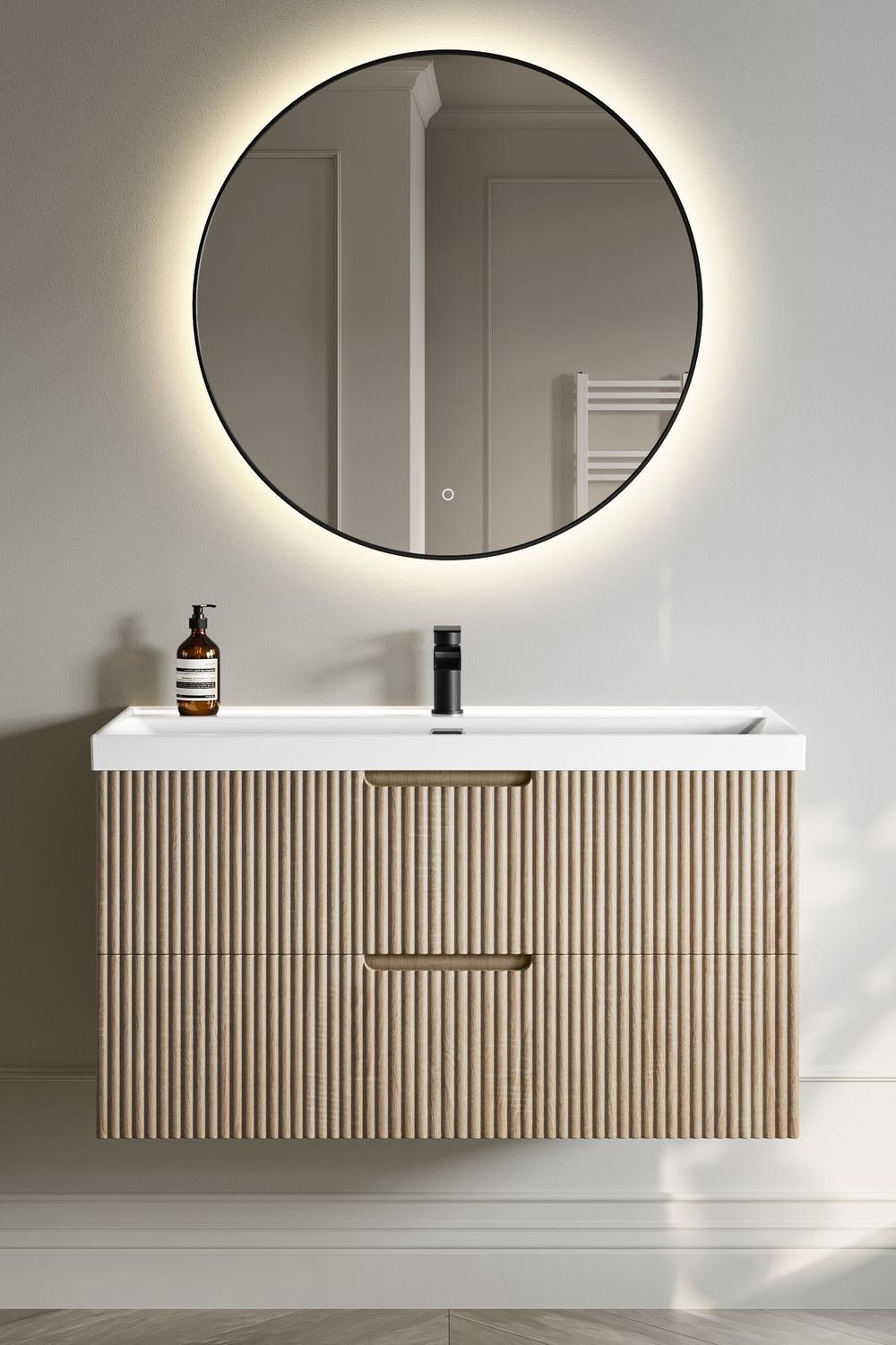 Modern light wood fluted bathroom vanity with white sink