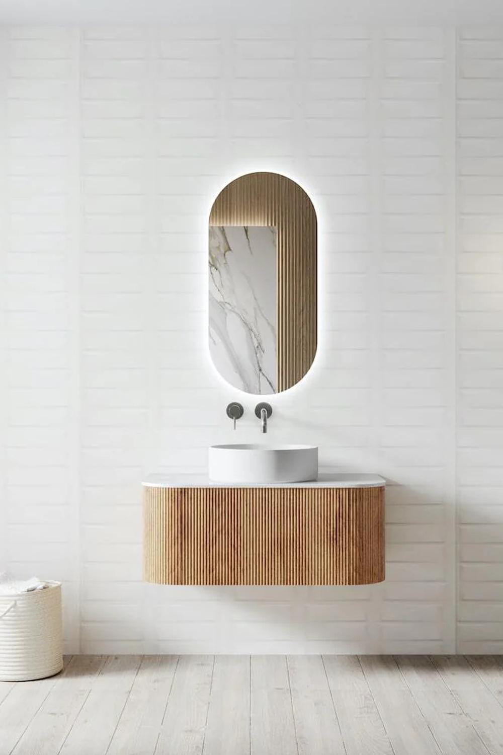 Modern fluted vanity with wood and white elements