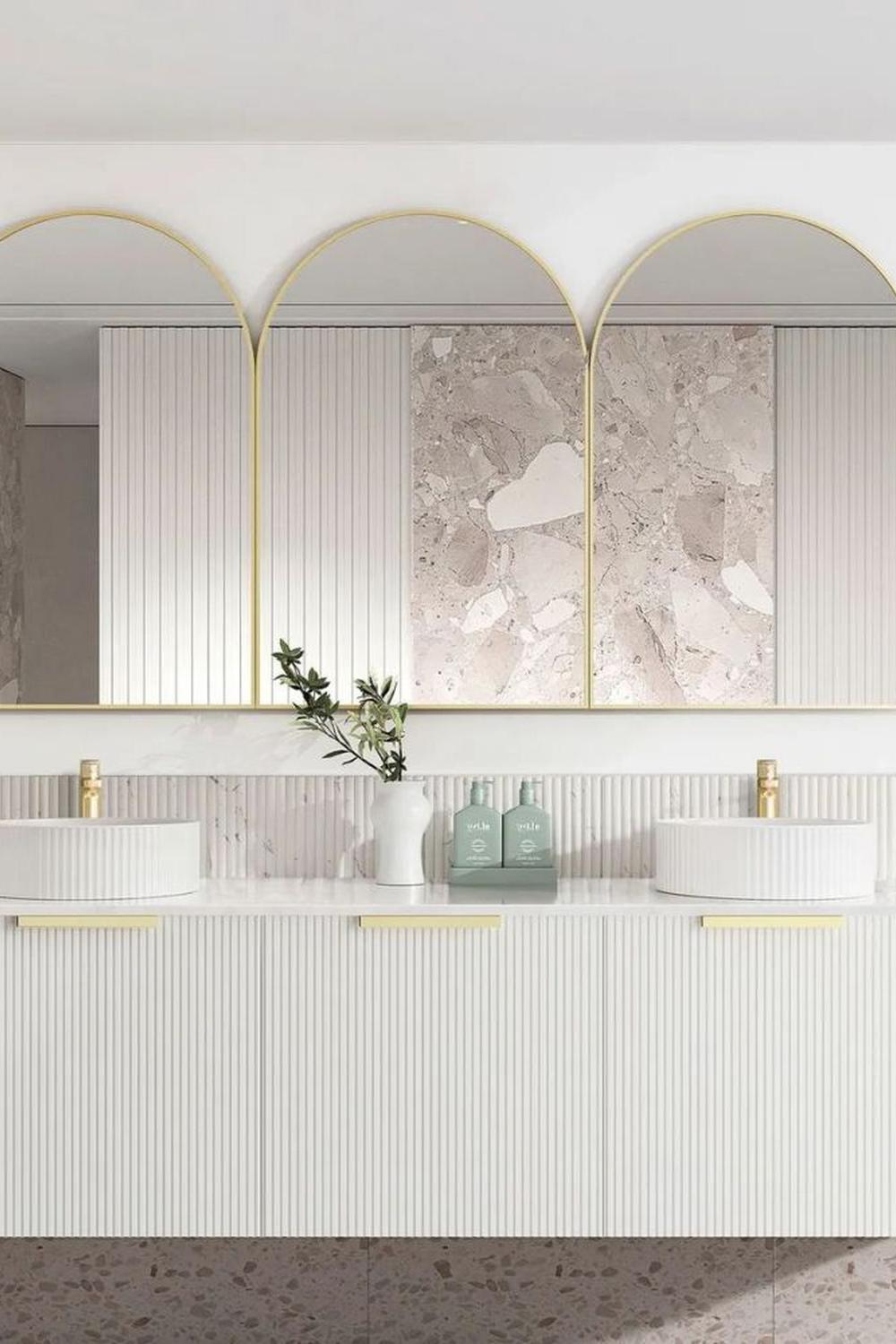 Symmetrical fluted bathroom vanity with dual sinks