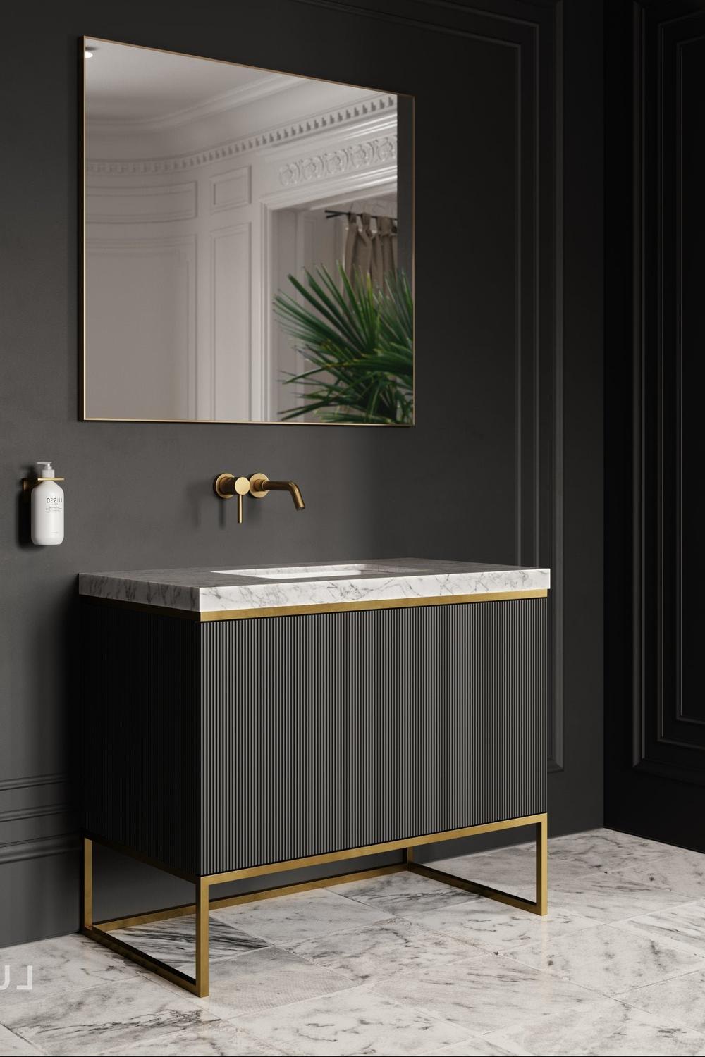 Fluted bathroom vanity in dark colors with elegant crown