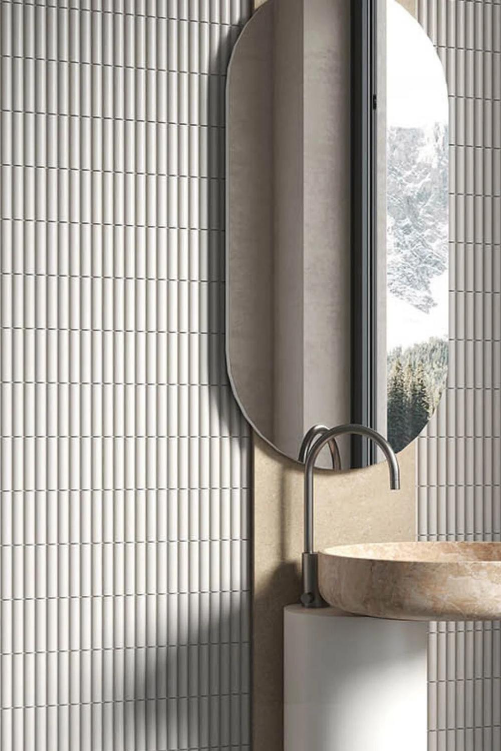 Stress-free bathing experience amidst fluted tiles