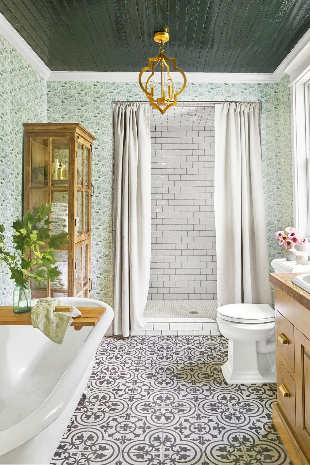Elegant bathroom with patterned gray and white tiles