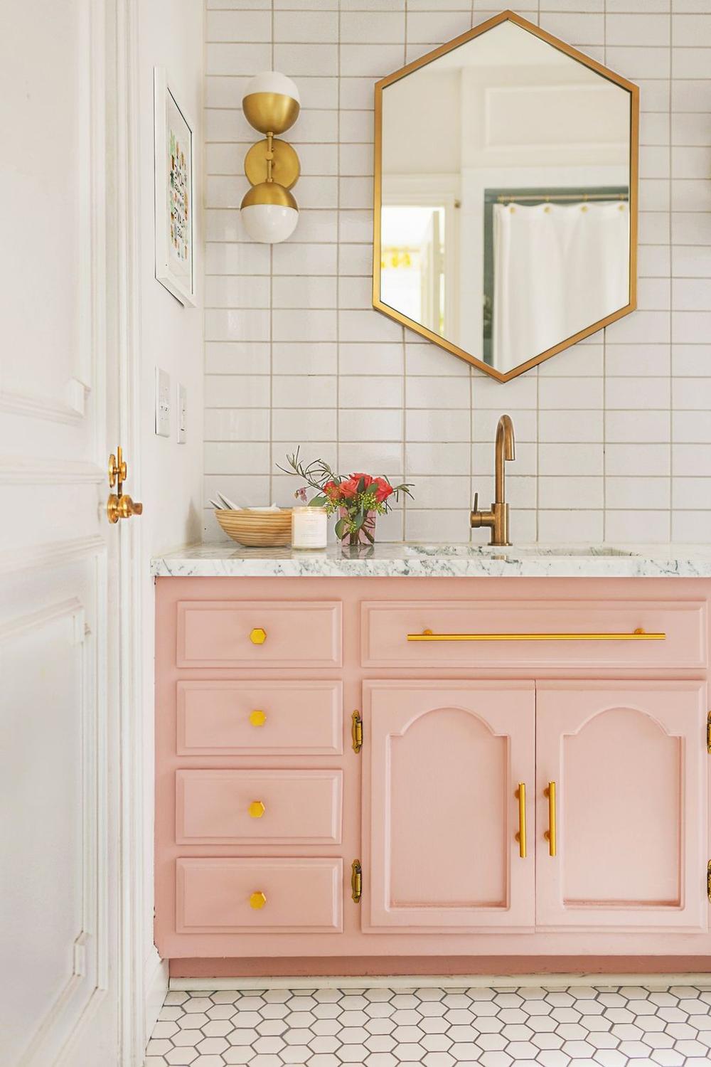 Beautifully designed girls bathroom with elegant touches in soft colors.