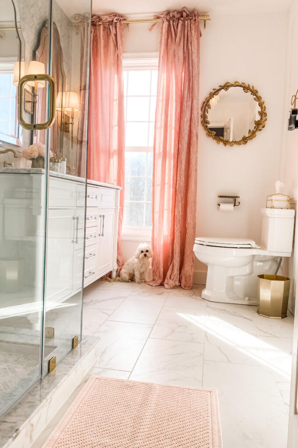 Girly bathroom with soft pastel colors and elegant decor