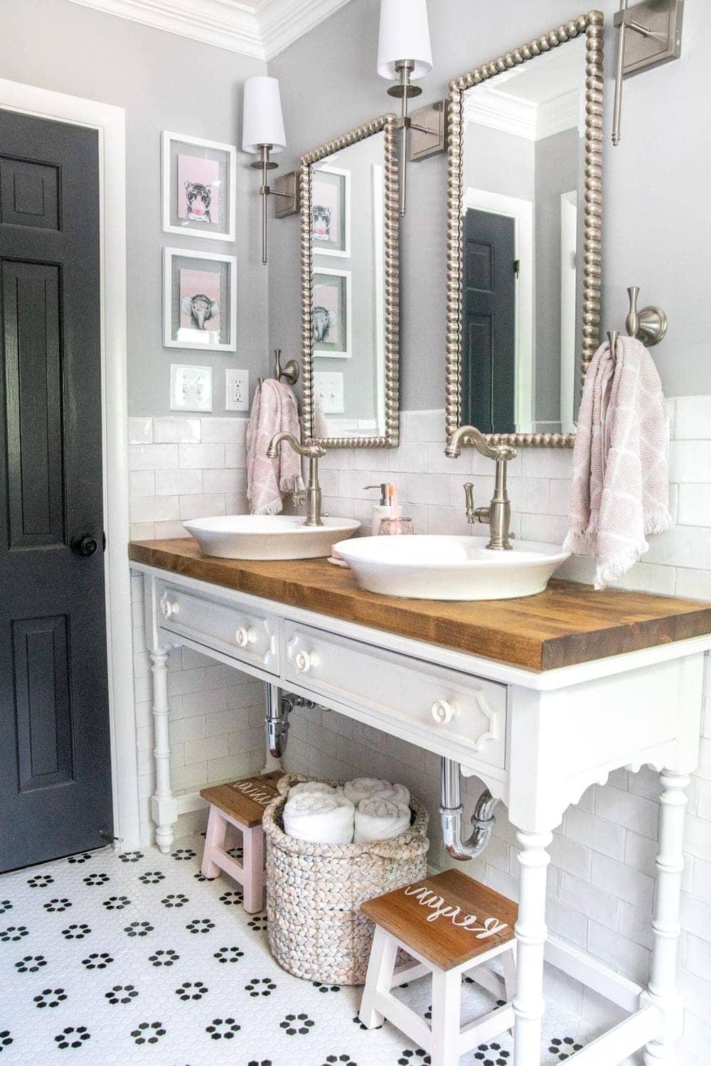 Contemporary girly bathroom with dual sinks and rustic charm