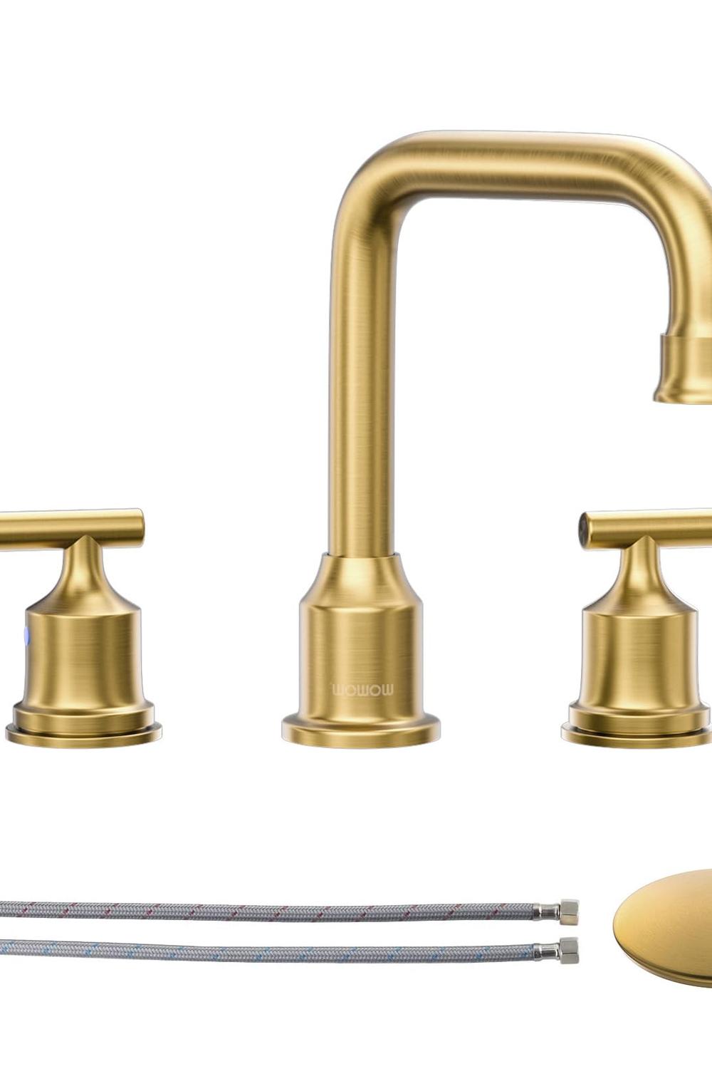 Gold accents in the modern shower stall enhancing contemporary feel