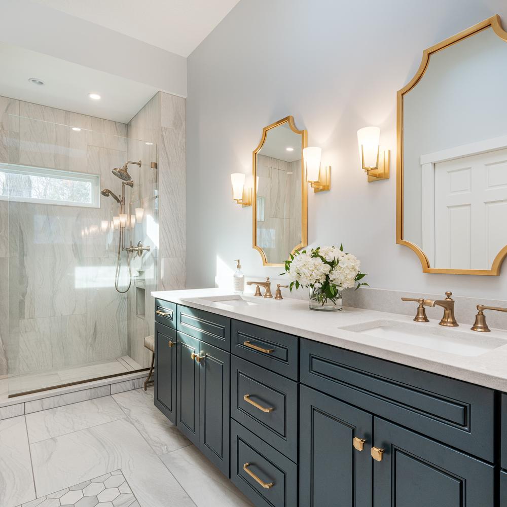 Assorted elegant gold bathroom accessories decorating a stylish space