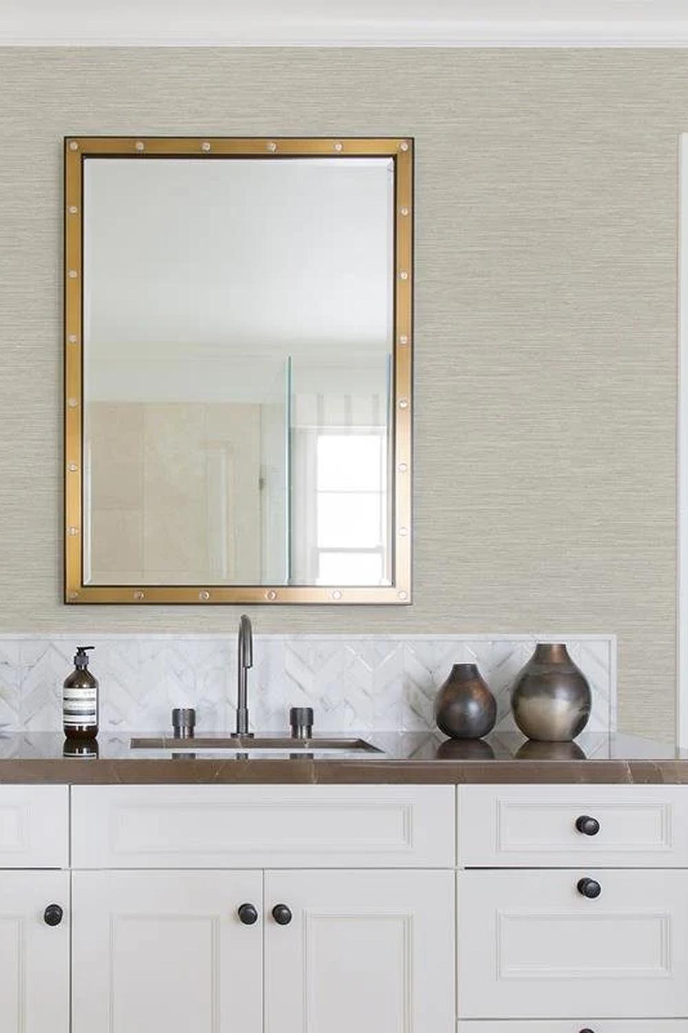 Contemporary elegance highlighted through grasscloth wallpaper and stylish decor.