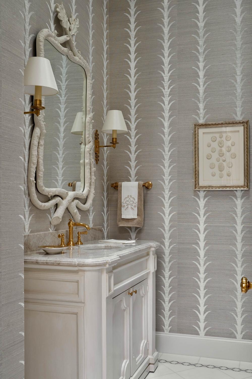 Elegant botanicals in a bathroom featuring refined grasscloth wallpaper.