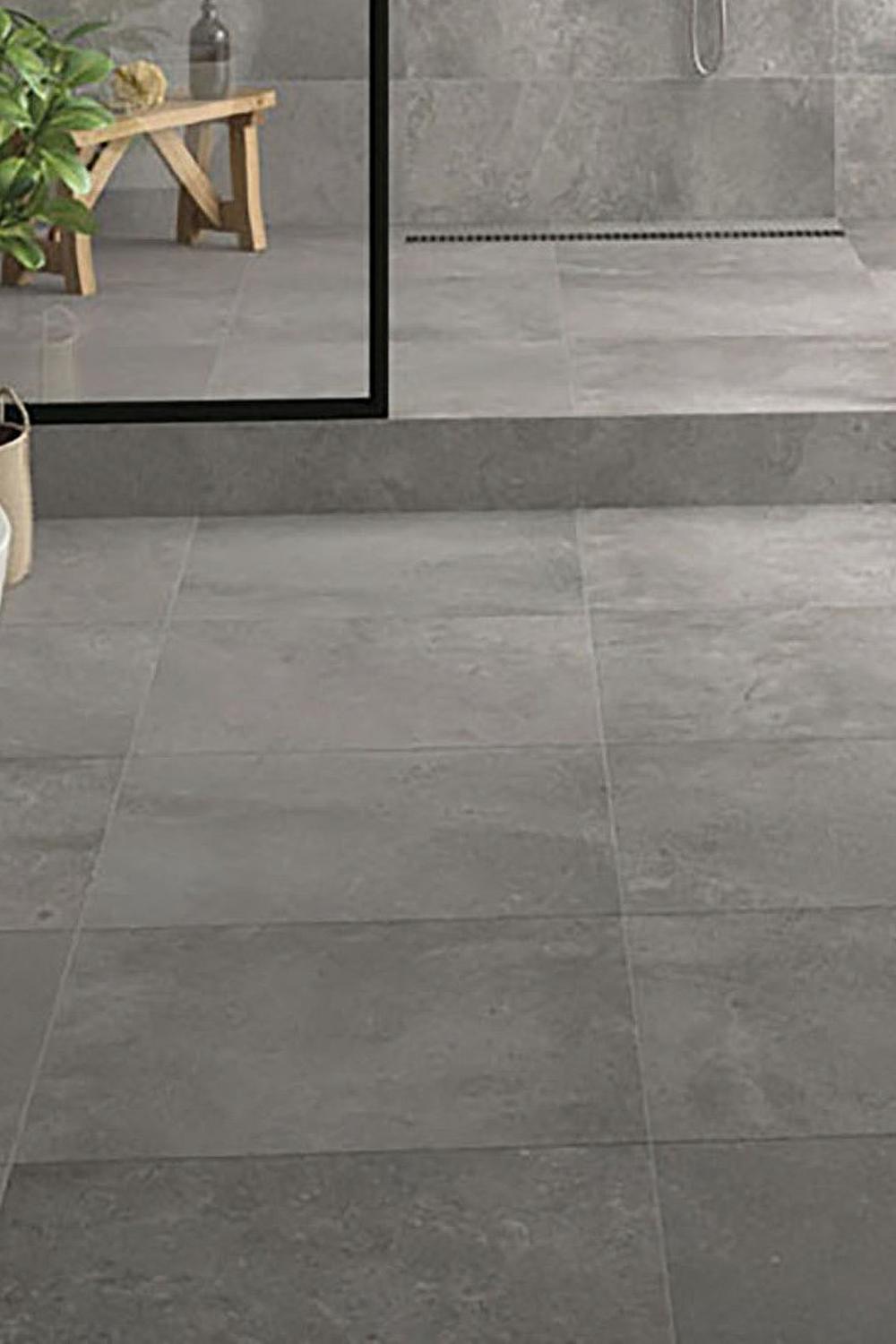 Baño elegante con azulejos gris contemporáneo