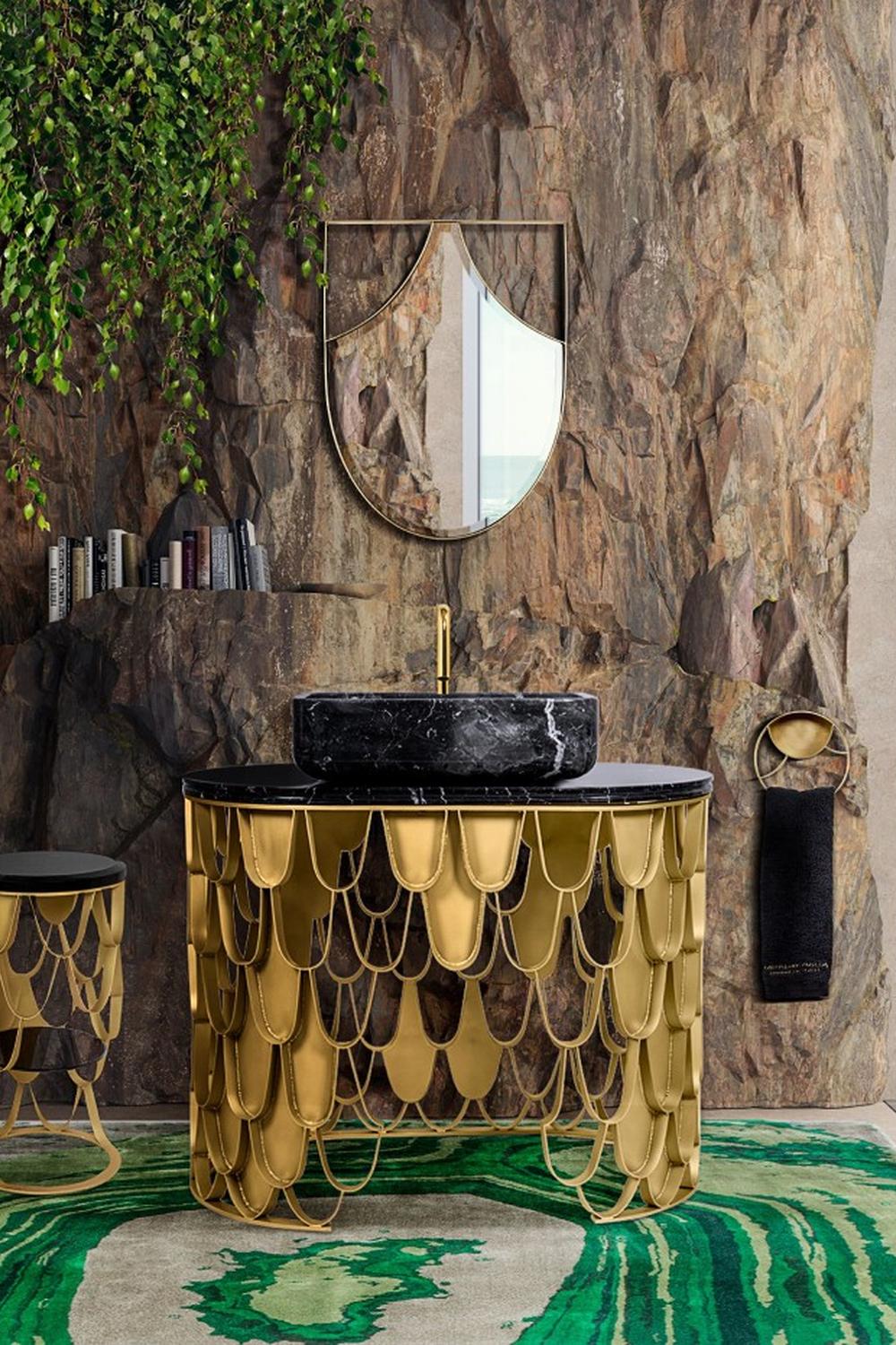 Lavish bathroom featuring a round vanity with a cascading gold finish.