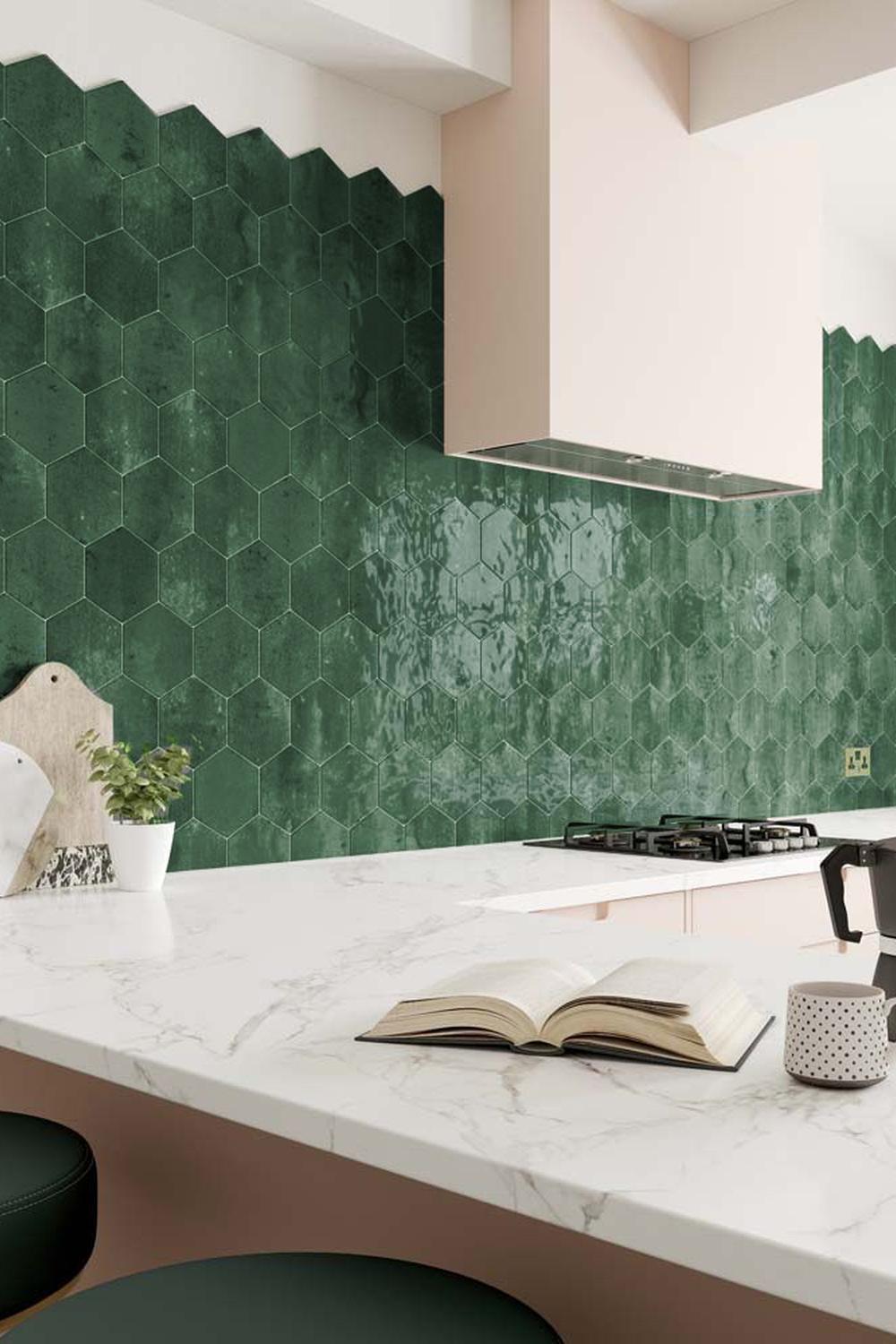 Stylish modern kitchen showcasing a wall adorned with green hexagon tiles