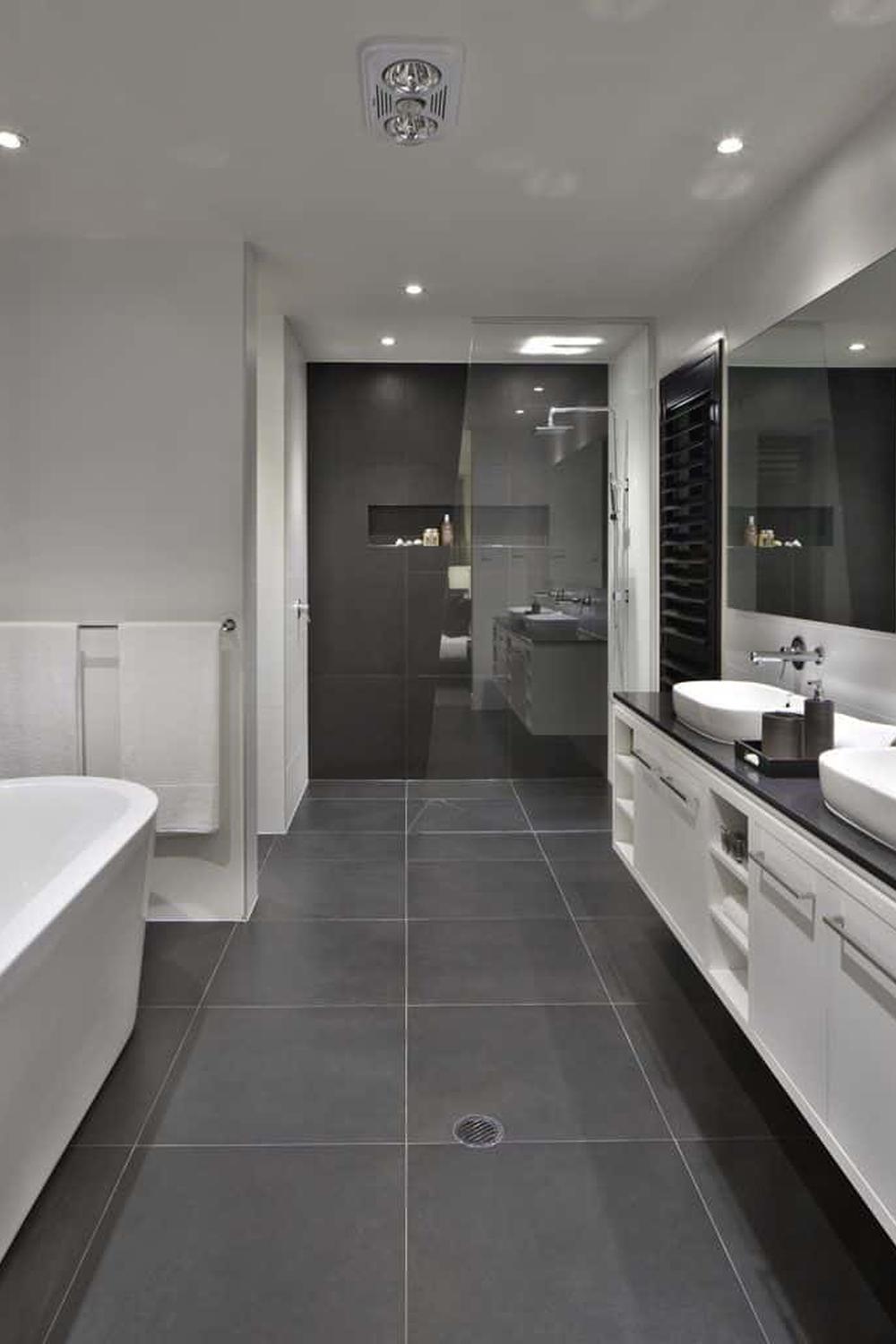 Baño gris moderno con un toque de sofisticación y sencillez