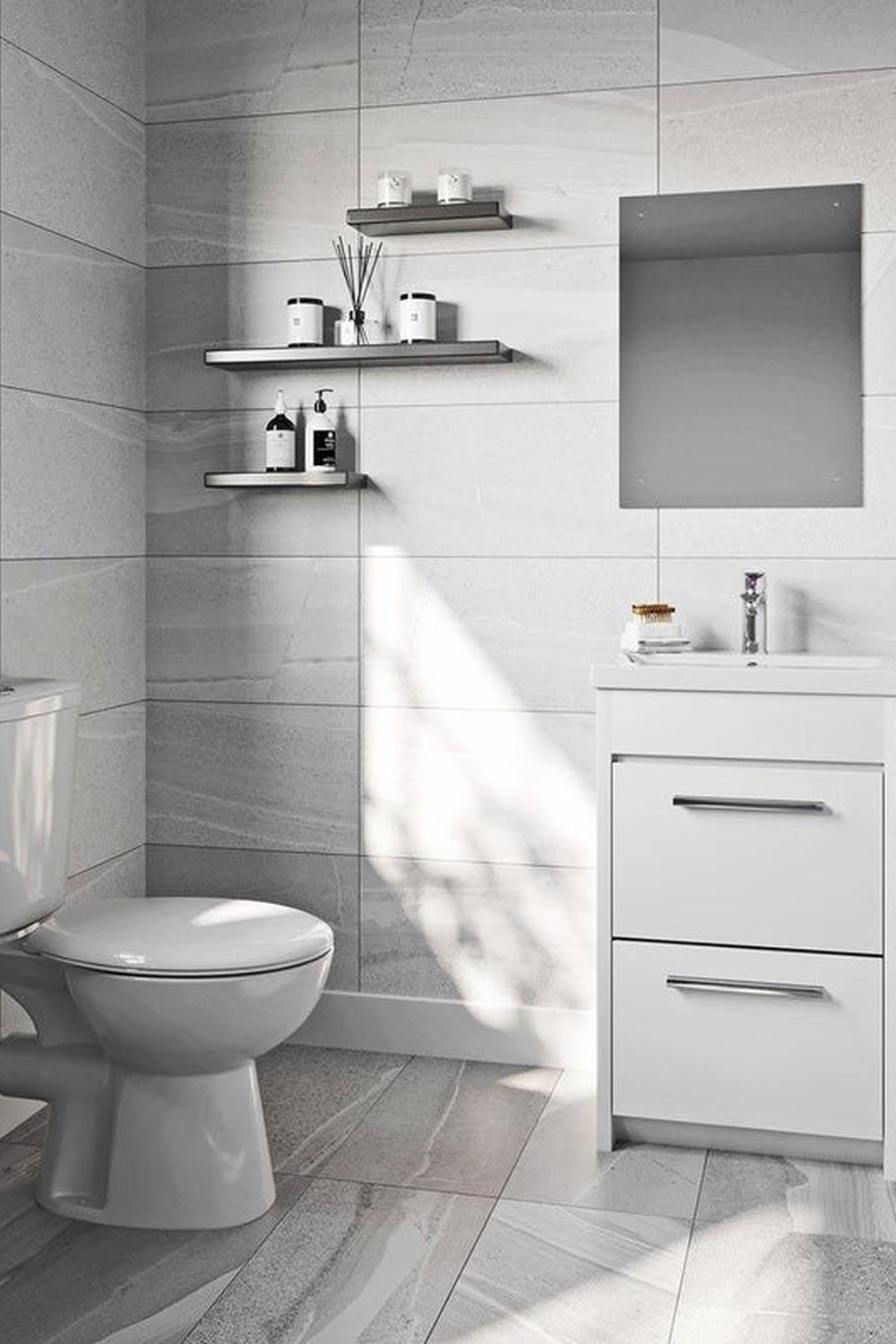 Baño gris con estilo y un toque minimalista